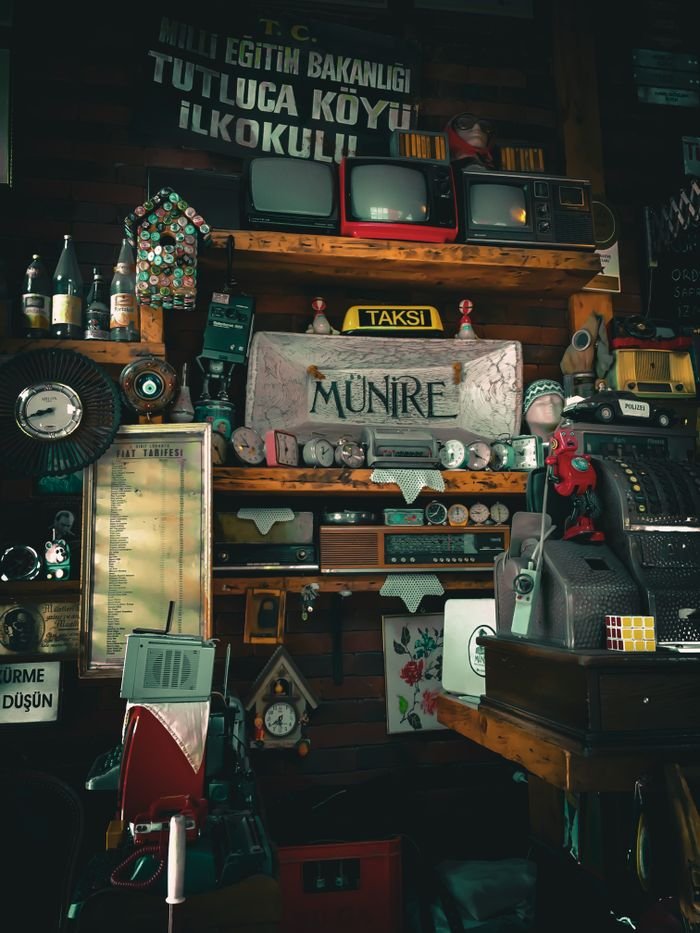 An eclectic array of vintage items and antique collectibles displayed in a shop in İzmir, Türkiye.